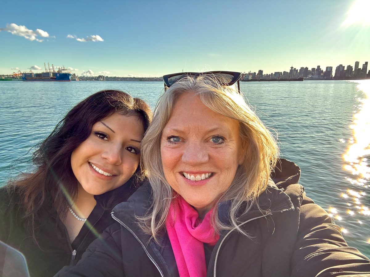 Catherine Pope on the North Shore waterfront with her daughter